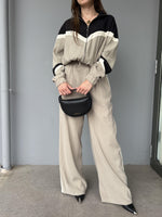 Pantalone con banda laterale