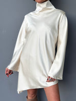 Blusa collo alto