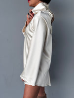Blusa collo alto