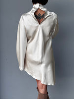 Blusa collo alto