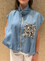 Gilet con tasca pailletes
