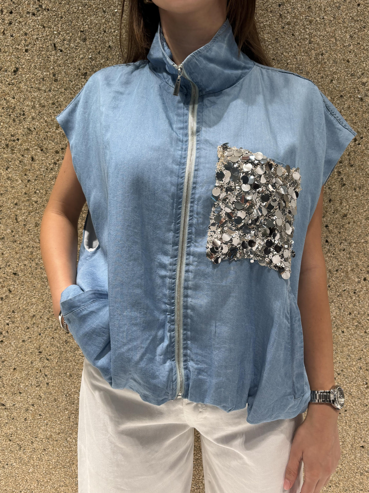 Gilet con tasca pailletes
