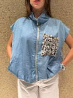 Gilet con tasca pailletes