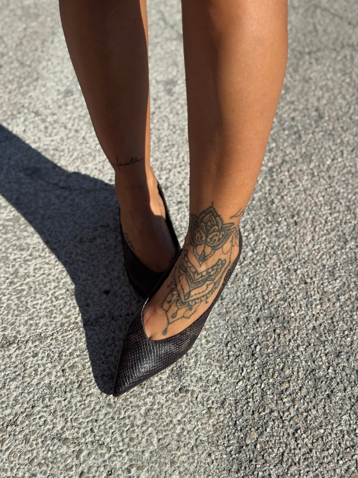 Decollete a punta con tacco mini