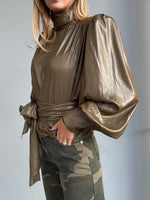 Blusa con spalline