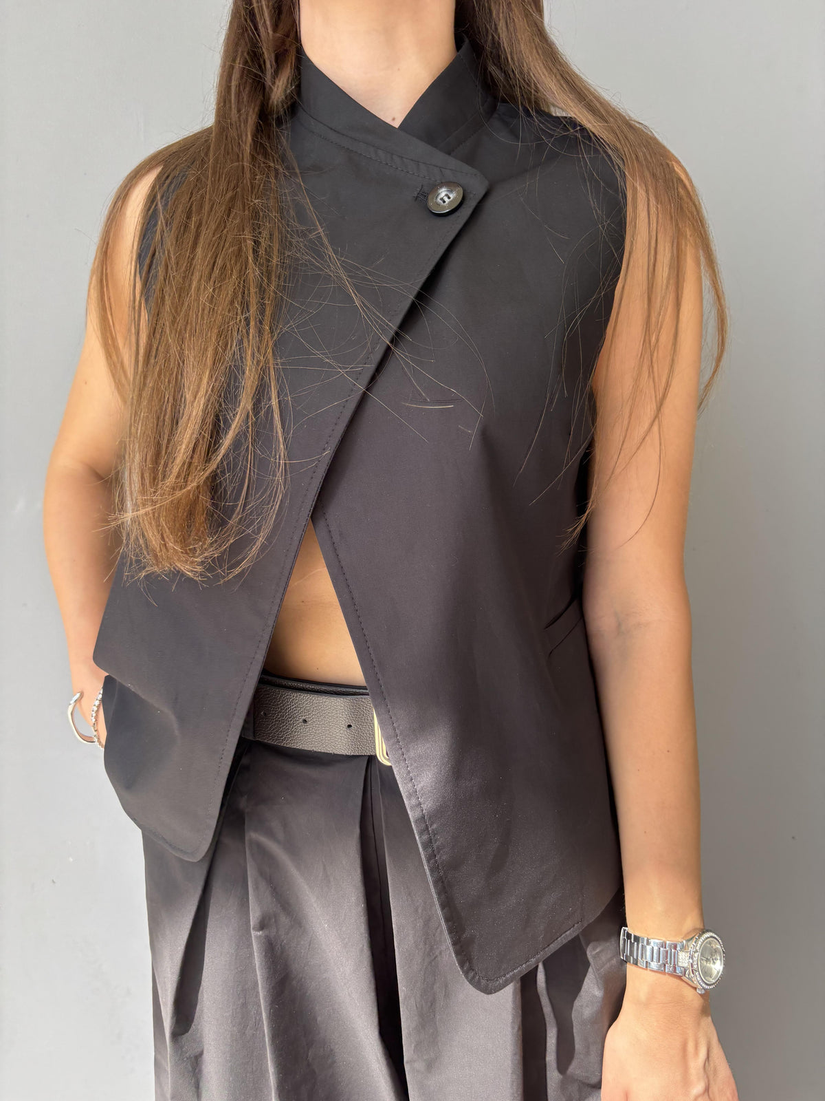 Gilet con abbottonatura asimmetrica