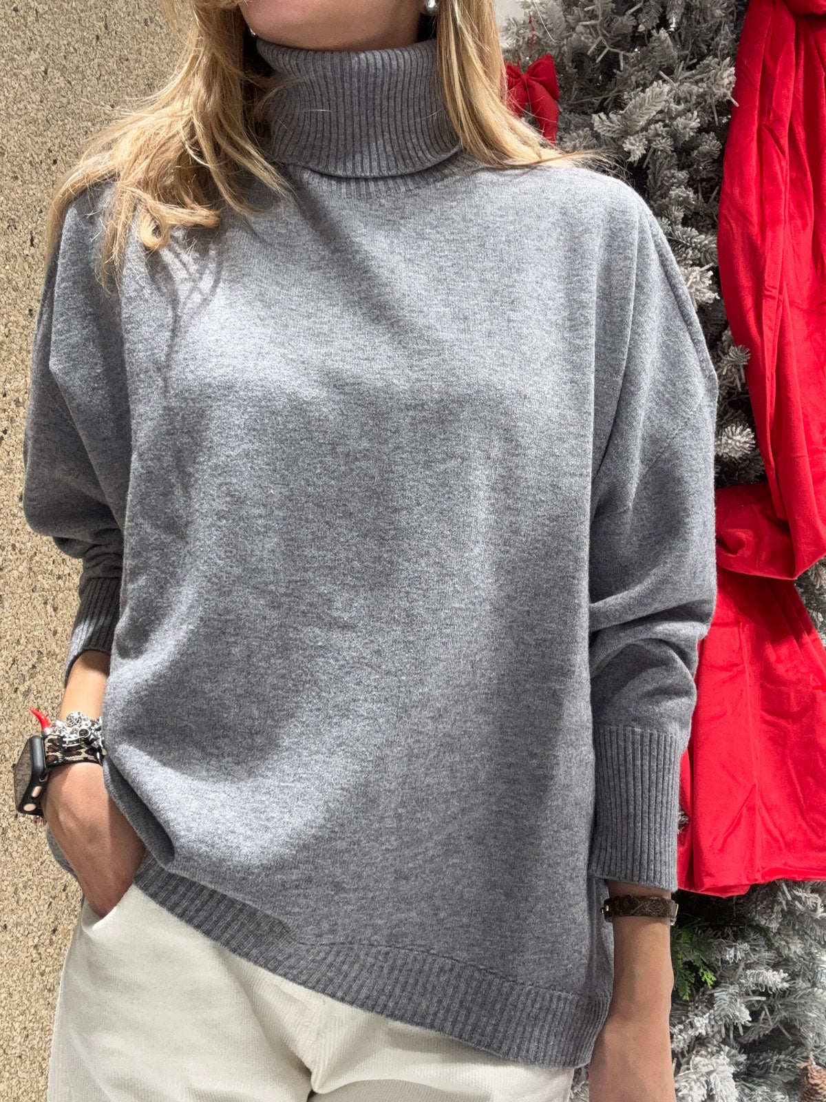 Maglia collo alto svasata