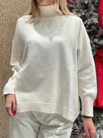 Maglia collo alto svasata