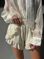 Shorts in pizzo
