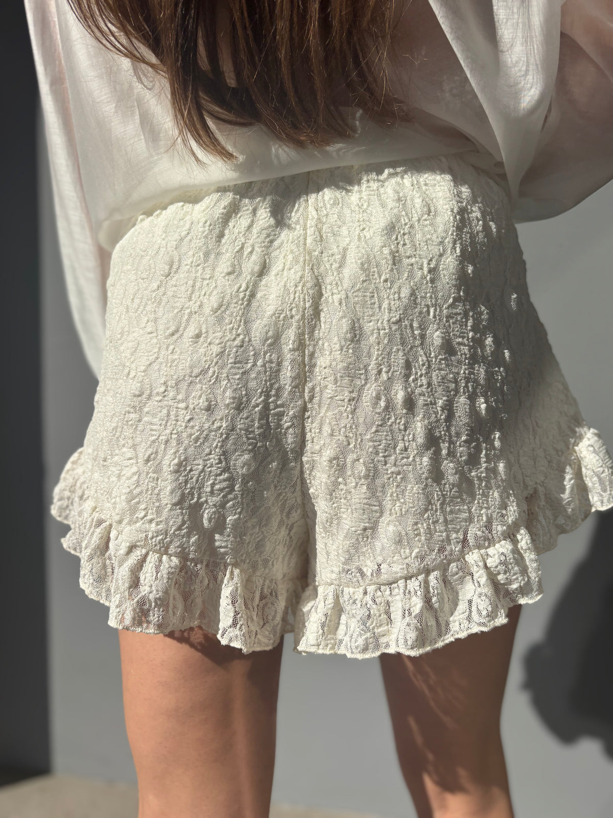 Shorts in pizzo