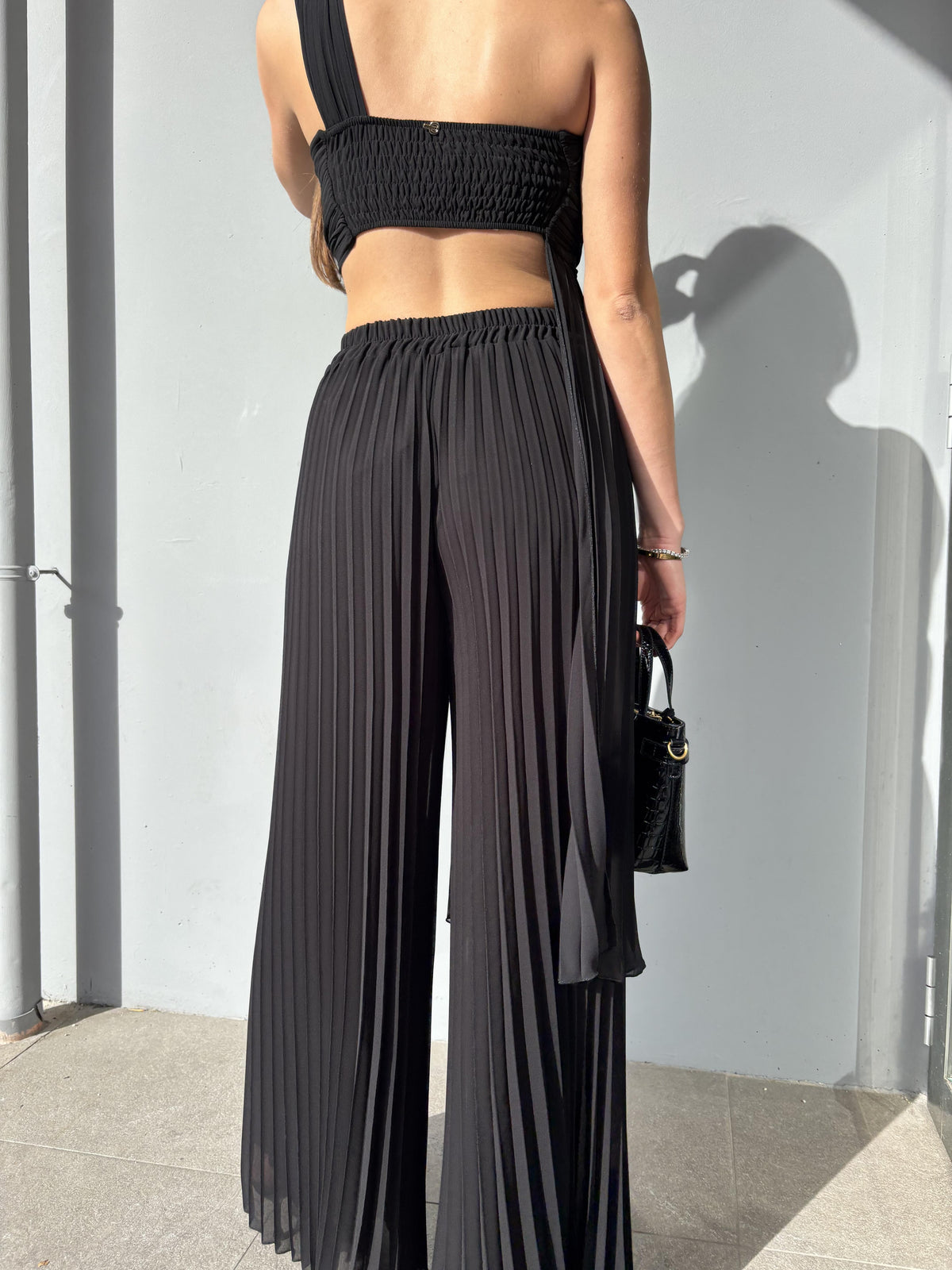 Pantalone palazzo plissé