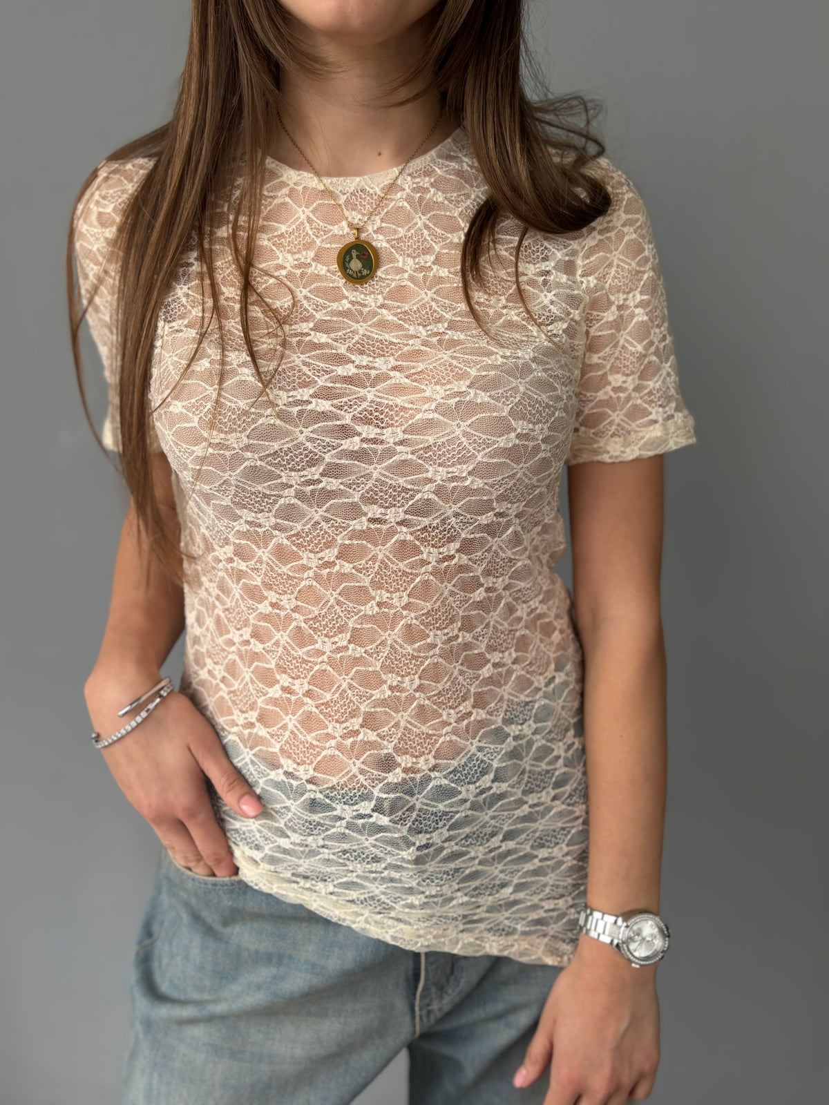 Maglia asimmetrica in pizzo