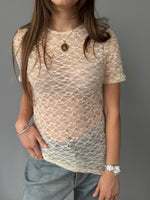 Maglia asimmetrica in pizzo