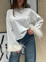 T-shirt manica lunga con piume finali
