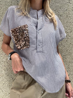 Camicia righe con tasca pailletes